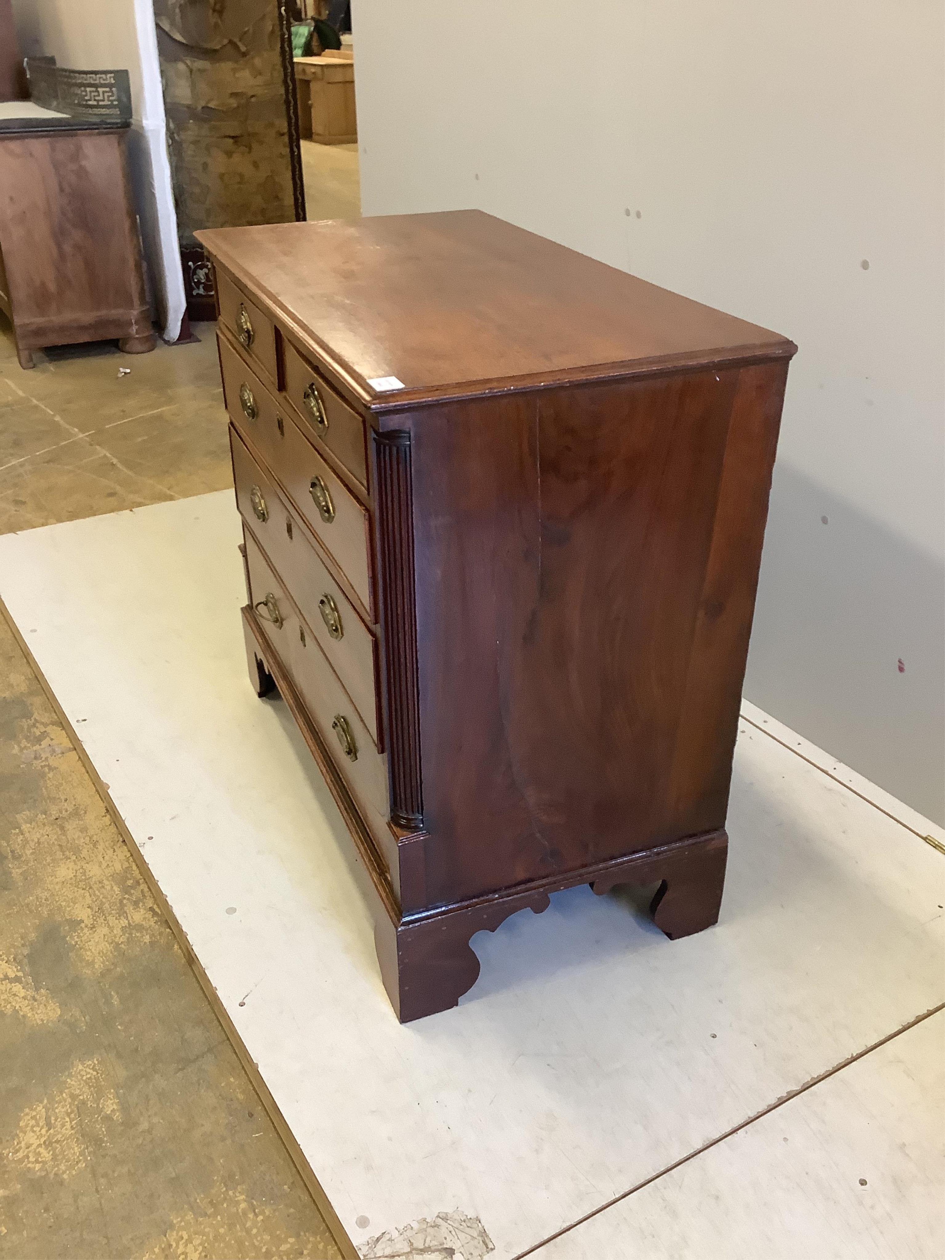 A George III and later oak and mahogany chest of drawers, width 102cm, depth 53cm, height 92cm. Condition - fair to good